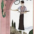 A Vintage Vogue Magazine Cover Of A Woman #1