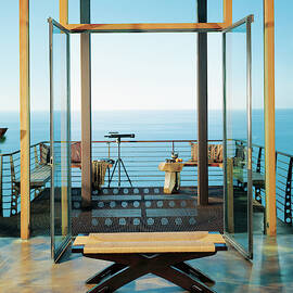 View Of Balcony Near Seaside by Mary E. Nichols