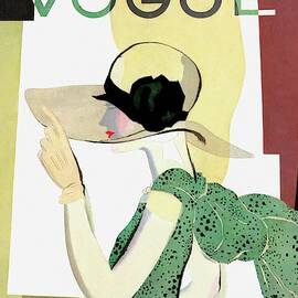 A Vintage Vogue Magazine Cover Of A Woman by Pierre Mourgue