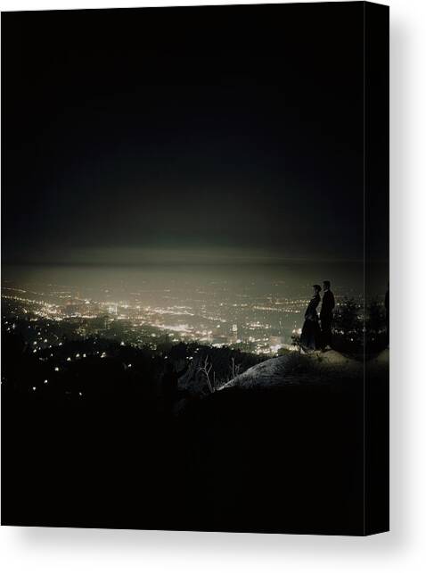 A City At Night Canvas Art Print by Constantin Joffe