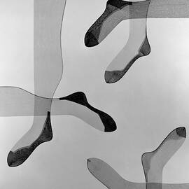A Collage Of Stockings by Herbert Matter