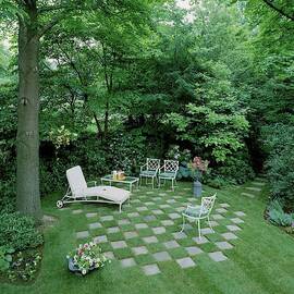 A Garden With Checkered Pavement by Pedro E. Guerrero