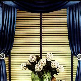 A House And Garden Cover Of Flowers By A Window by Anton Bruehl