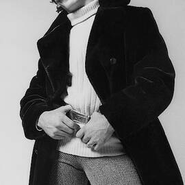 A Male Model Wearing A Fake Seal Coat Designed by Peter Levy