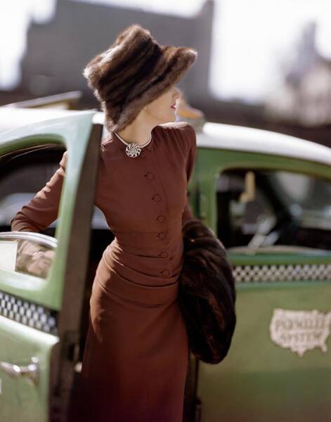 Wall Art - Photograph - A Model Getting Out Of A Cab by Constantin Joffe