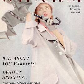A Model Wearing A Duster Coat By Duchess Royal by Milton Greene