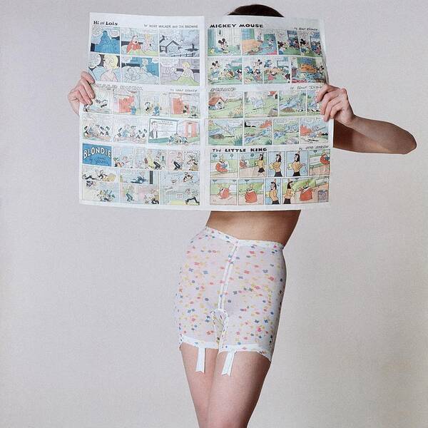 A Model Wearing A Girdle With A Comic Art Print
