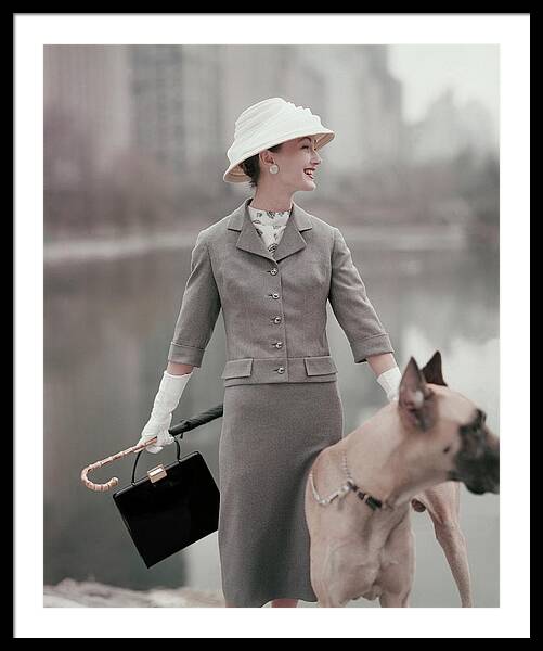A Model Wearing A Gray Suit With A Dog Framed Print