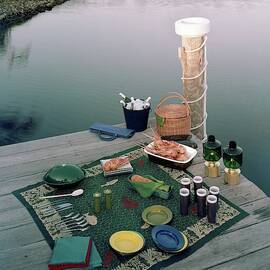A Picnic Set Up On A Dock by Ernst Beadle