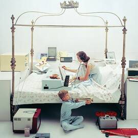 A Woman And A Boy Playing Instruments by Richard Rutledge