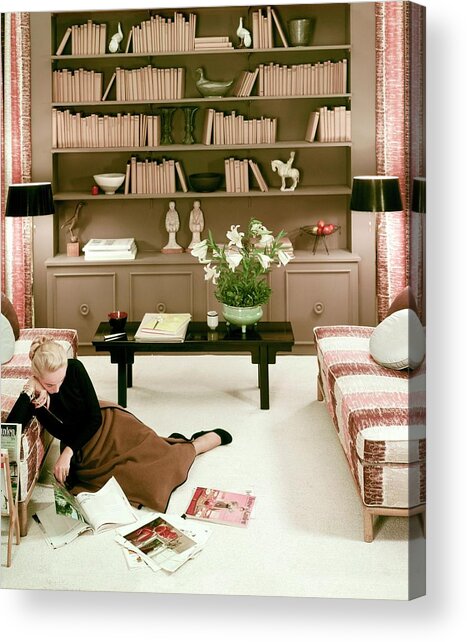 A Woman Reading Magazines On The Floor Acrylic Print