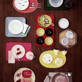 An Assortment Of Dinnerware by Tom Yee