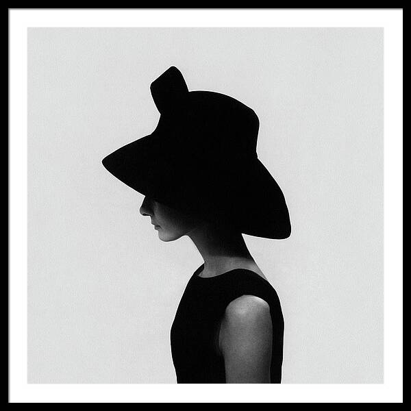 Audrey Hepburn Wearing A Givenchy Hat Framed Print