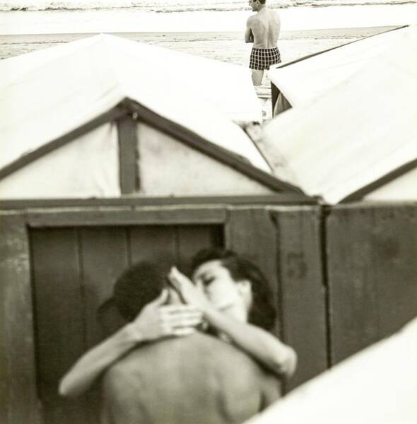 Couple Kissing By A Model Wearing Westwood Trunks Art Print
