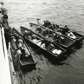 Currachs Next To A Steamer In The Lesser Aran by Pedro E. Guerrero