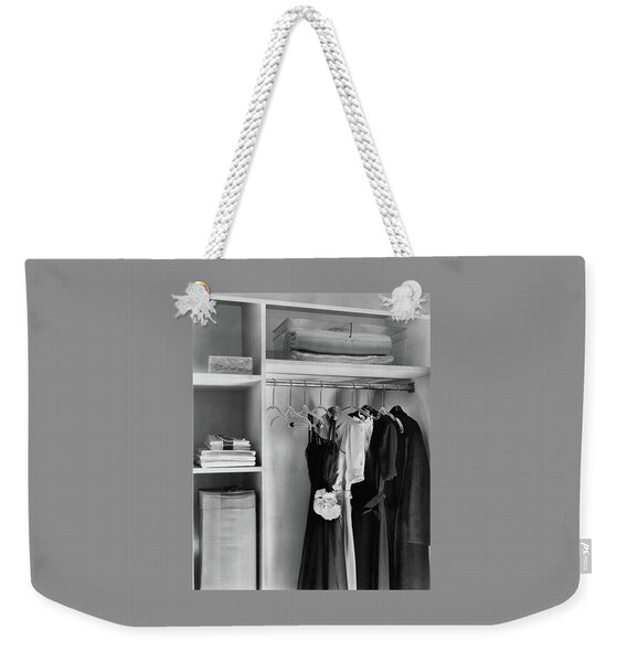 Dresses Hanging In A Closet Weekender Tote Bag