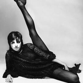 Liza Minnelli With Her Leg Raised by Bert Stern