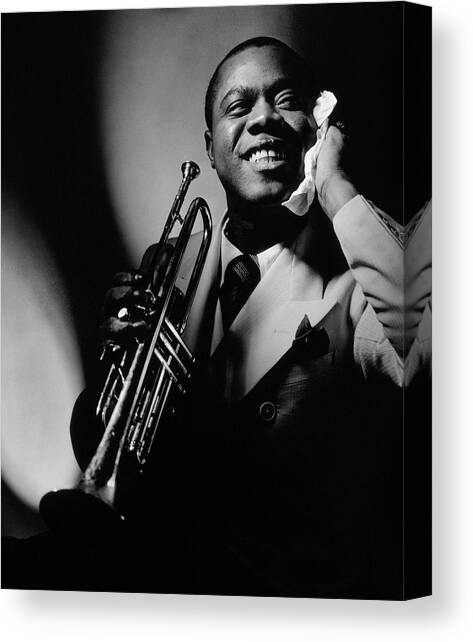 Louis Armstrong Holding A Trumpet Canvas Art Print by Anton Bruehl
