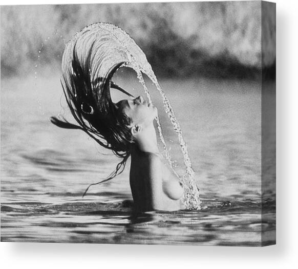 Marisa Berenson Flipping Her Hair In Water Canvas Art Print by Arnaud de Rosnay