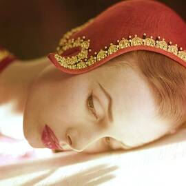 Model in Mr. John Cloche Hat by Milton Greene
