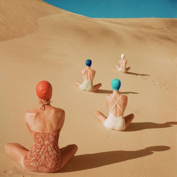 Models Sitting On Sand Dunes Art Print