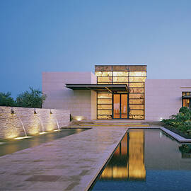 Modern Building With Pool At Dusk by Erhard Pfeiffer