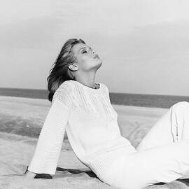Patti Hansen Wearing A Sweater And Matching Pants by Francesco Scavullo