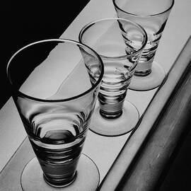 Three Glasses On A Shelf by Martin Bruehl