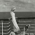 Two Models On The Deck Of A Cruise Ship