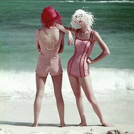 Two Models Standing On A Beach by Frances McLaughlin-Gill