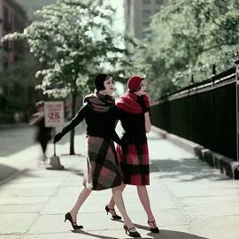 Two Models Wearing Plaid Mohair Skirts And Stoles by Sante Forlano