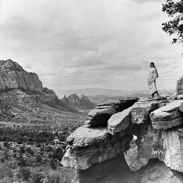 Veruschka On A Barren Cliff In The Arizona Desert Art Print