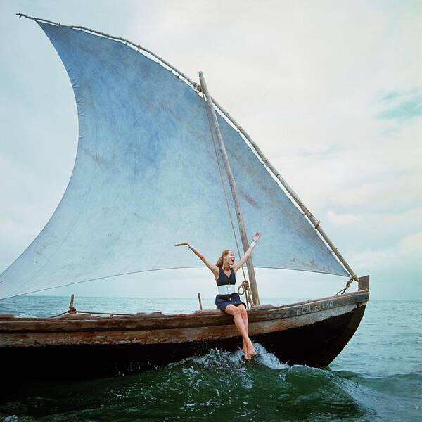 Wall Art - Photograph - Veruschka Von Lehndorff Sitting On Edge by Franco Rubartelli