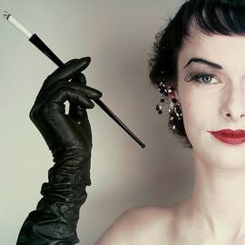 Victoria Von Hagen Holding A Cigarette Holder by Erwin Blumenfeld