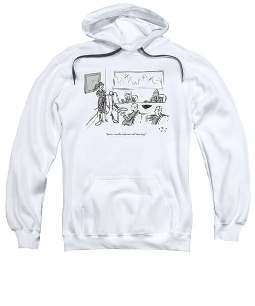 Woman Stands At The Front Of A Board Room Holding Sweatshirt