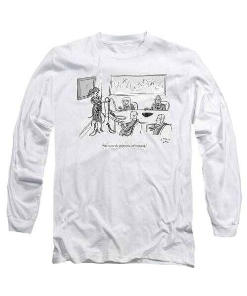 Woman Stands At The Front Of A Board Room Holding Long Sleeve T-Shirt