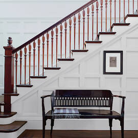Wooden Bench And Staircase Inside House by Scott Frances